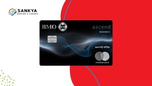 A black BMO Ascend World Elite® Business Mastercard® featuring a dynamic wave-like digital pattern is centered against a background with bold red and white sections. The Sankya Banking & Finance logo appears in the top left corner.