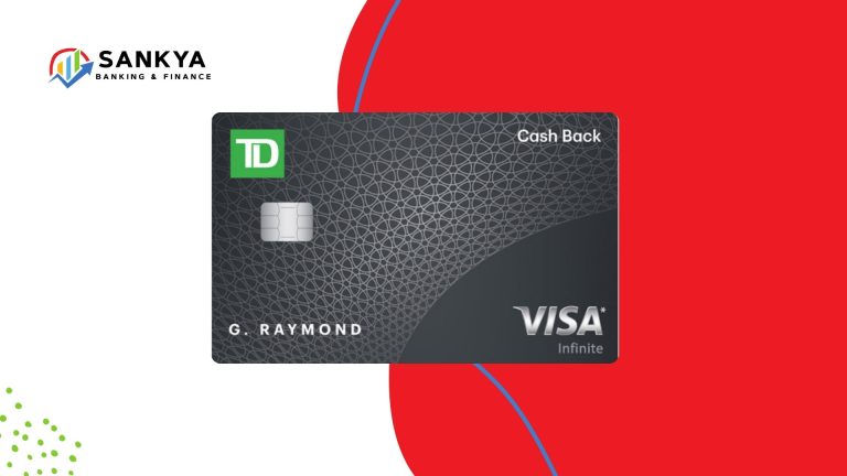 A close-up of the TD Cash Back Visa Infinite Card featuring its sleek black design with a geometric pattern. The card displays the TD logo, the Visa Infinite branding, and is personalized with the name 'G. RAYMOND.' The background is a bold red and blue design, highlighting the card's modern aesthetic. This image represents the TD Cash Back Visa Infinite Card, known for offering cashback rewards on eligible purchases.